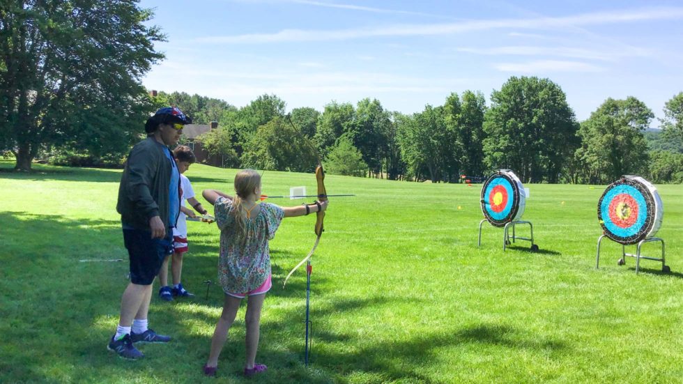 Campers on the archery field