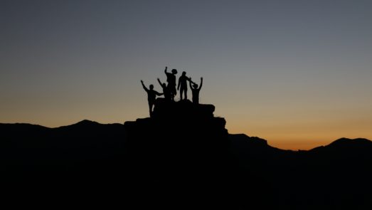 A group of teens at dusk